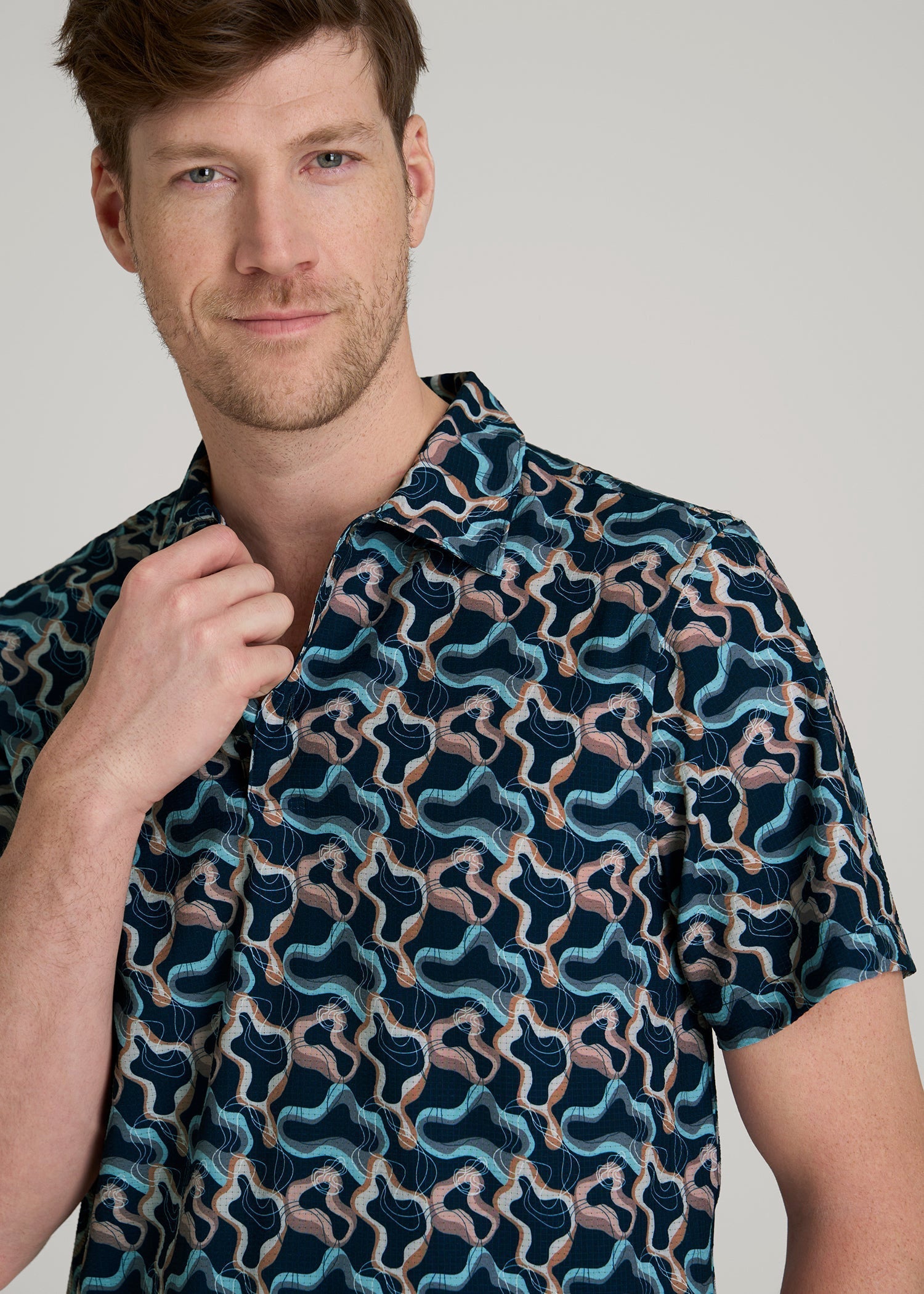 Coastal Perforated Polo Shirt for Tall Men in Blue and Rose Abstract